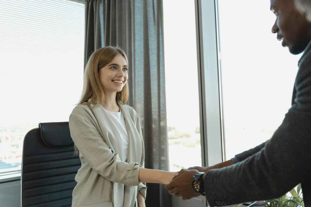 young woman getting hired for a marketing position