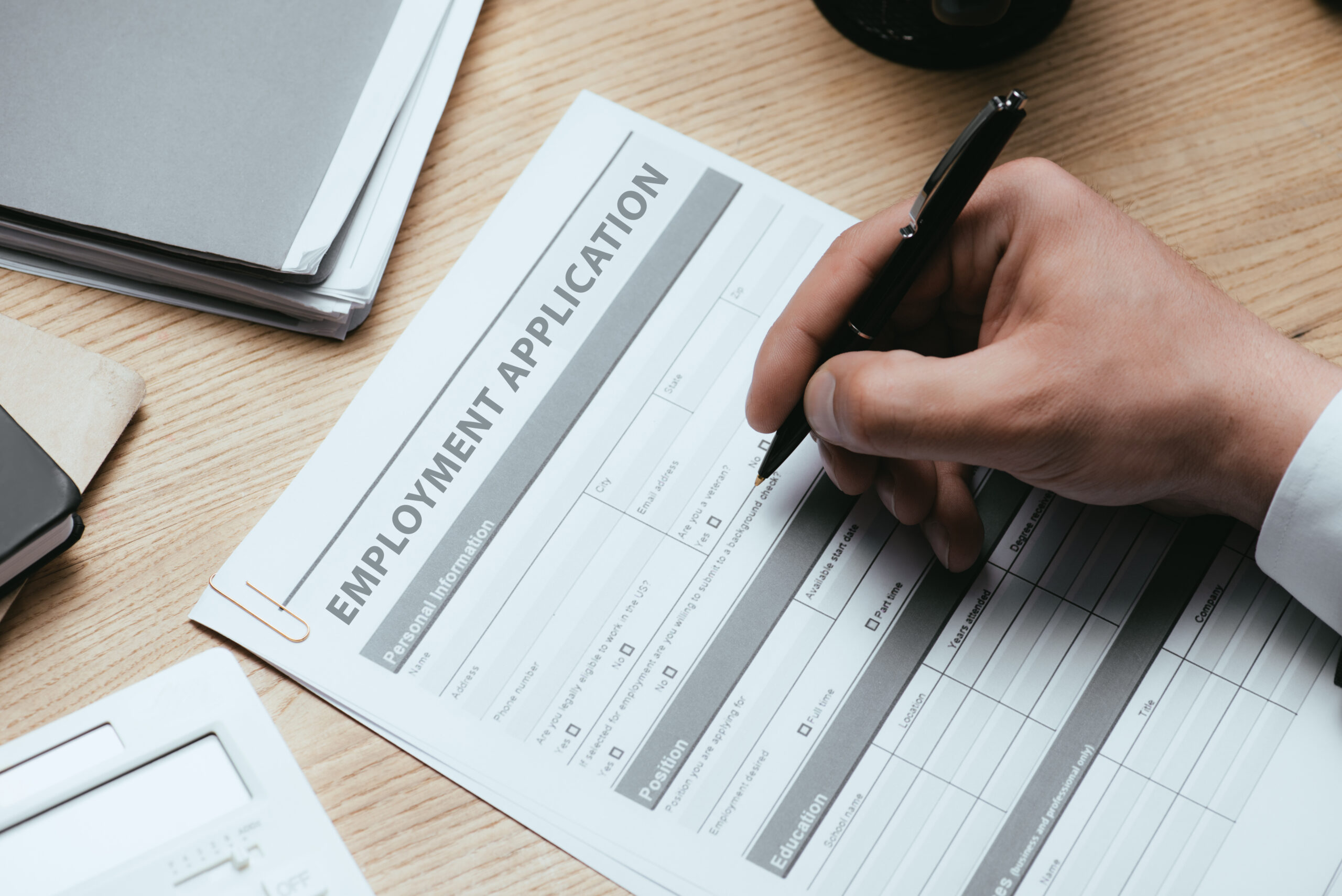 New graduate filling out a job application form